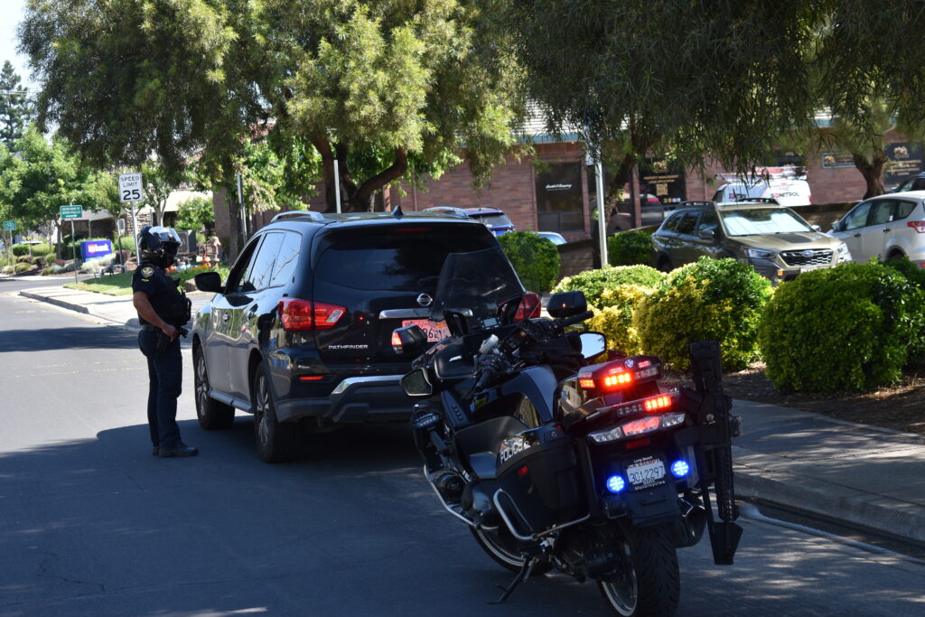 Manteca Police Officer Plascencia, a committed motor officer, conducting a traffic stop.