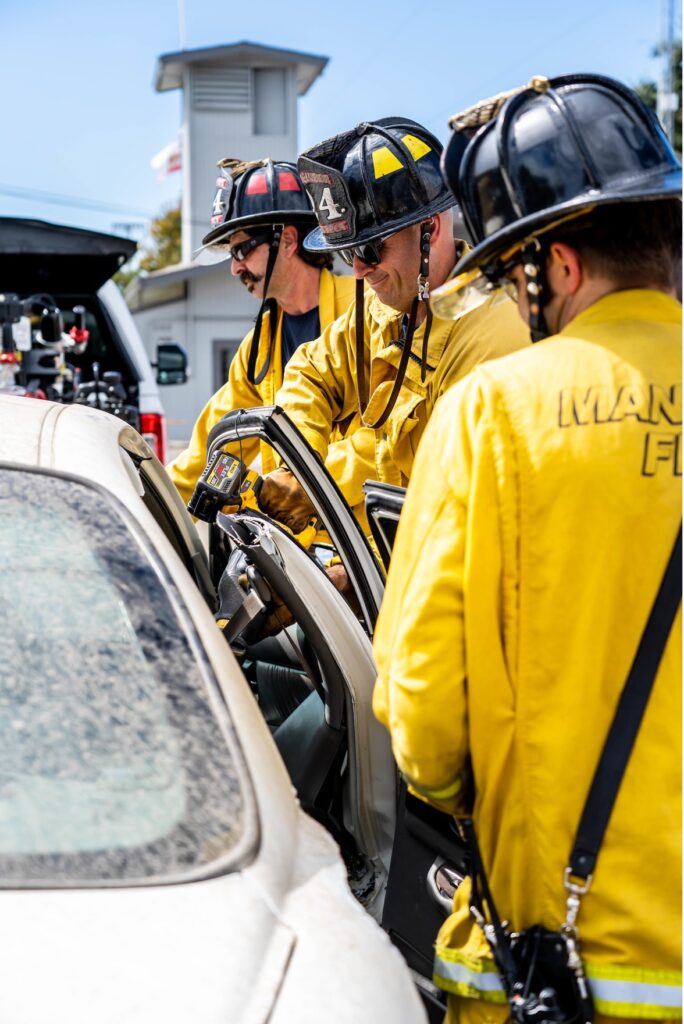 Manteca firemen free a trapper person in a car.